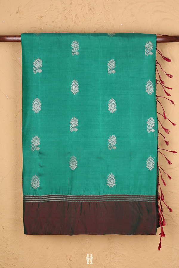 Soft Silk Saree In Green With Floral Buttas