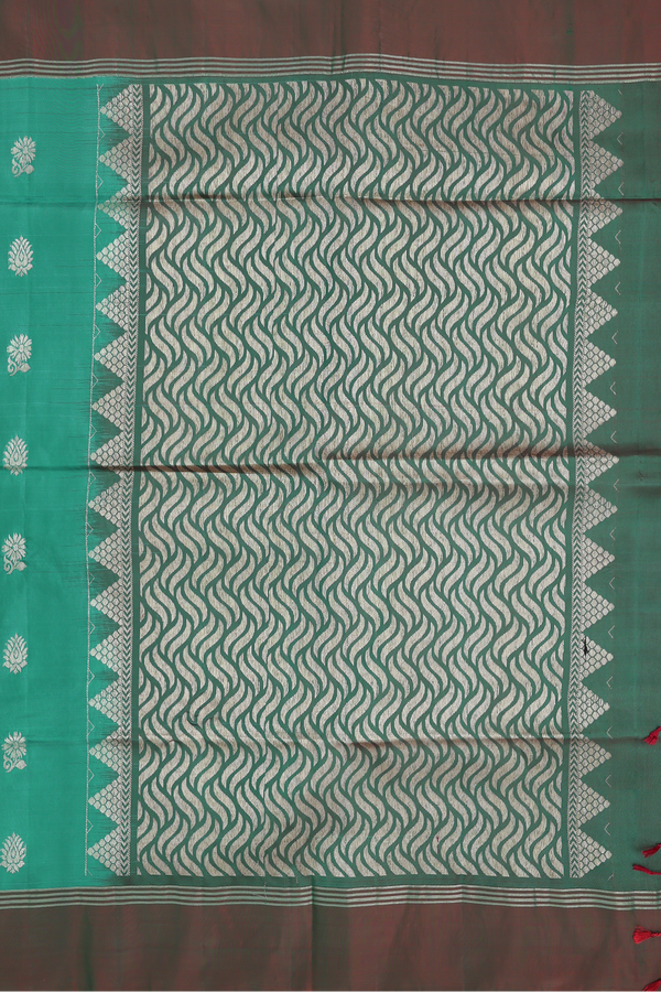 Soft Silk Saree In Green With Floral Buttas