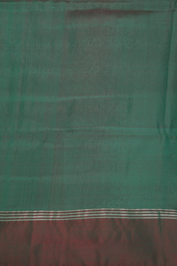 Soft Silk Saree In Green With Floral Buttas