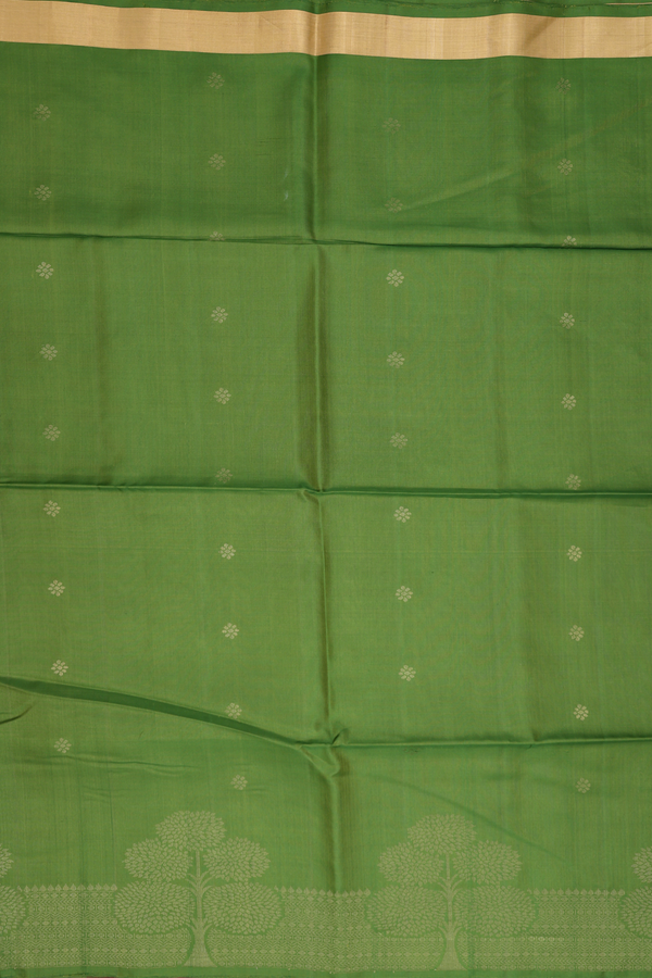 Soft Silk Saree In Green With Floral Buttas