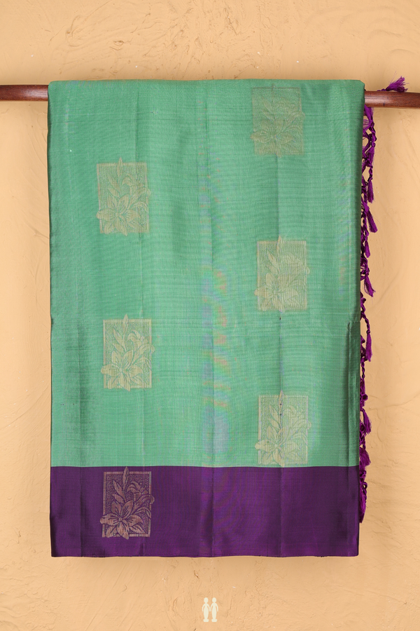 Soft Silk Saree In Green With Floral Motifs
