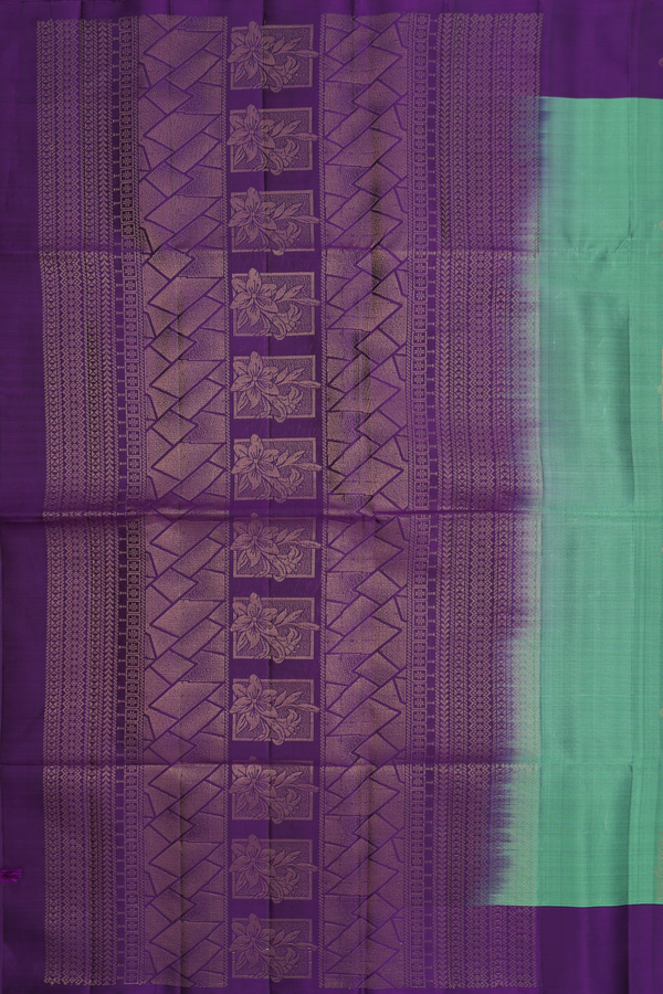 Soft Silk Saree In Green With Floral Motifs
