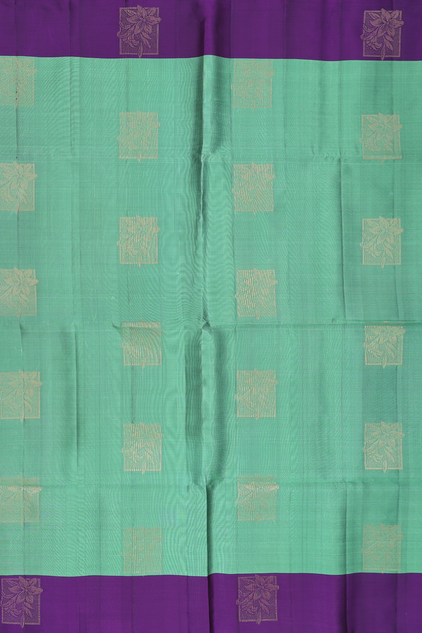 Soft Silk Saree In Green With Floral Motifs