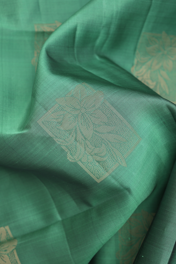 Soft Silk Saree In Green With Floral Motifs