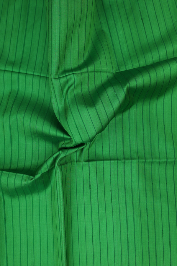 Soft Silk Saree In Green With Self Stripes Design