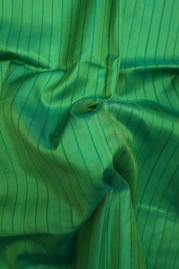 Soft Silk Saree In Green With Stripes Design