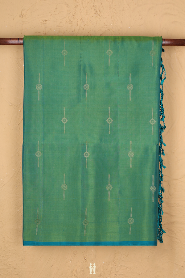 Soft Silk Saree In Green With Zari Buttas