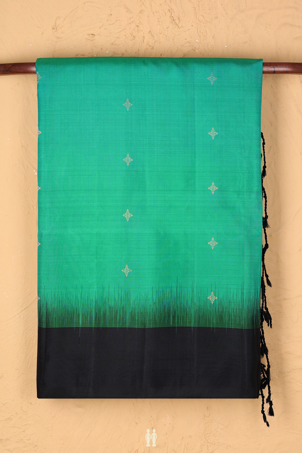 Soft Silk Saree In Green With Zari Buttas