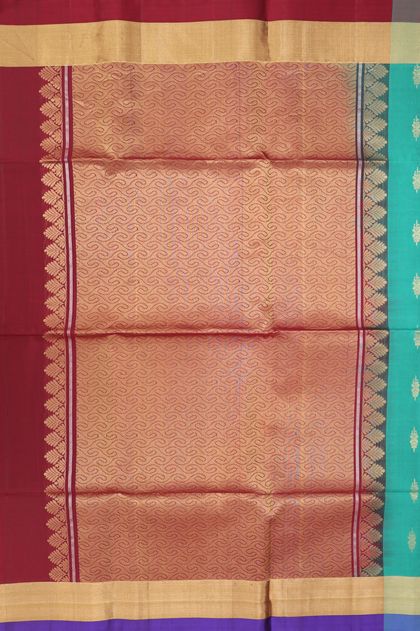 Soft Silk Saree In Green With Zari Buttas