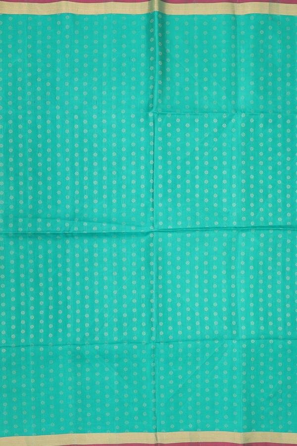 Soft Silk Saree In Green With Floral Buttas