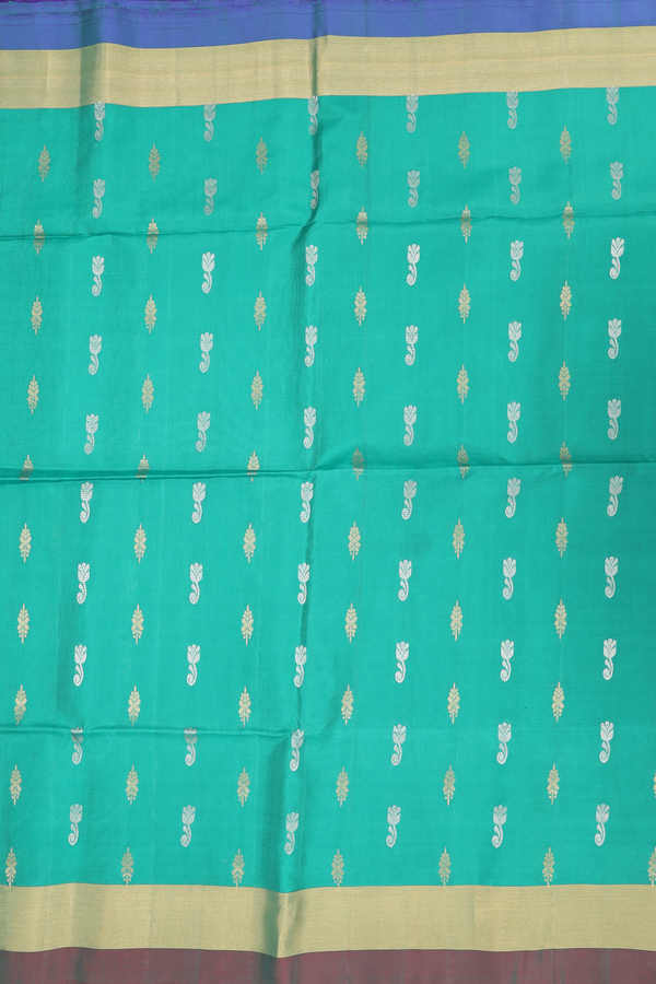 Soft Silk Saree In Green With Zari Buttas