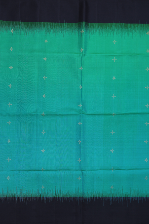 Soft Silk Saree In Green With Zari Buttas
