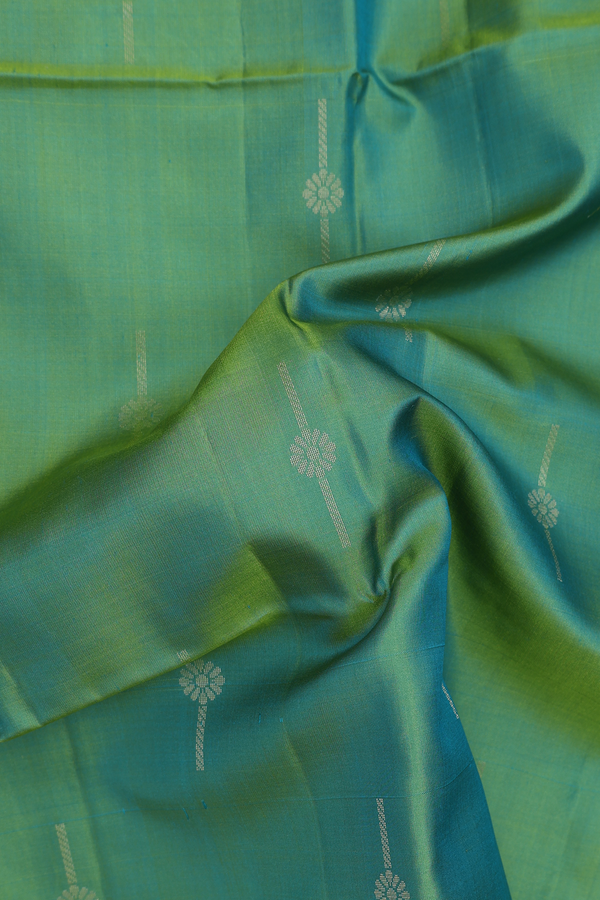 Soft Silk Saree In Green With Zari Buttas