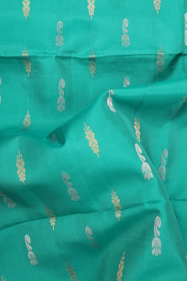 Soft Silk Saree In Green With Zari Buttas