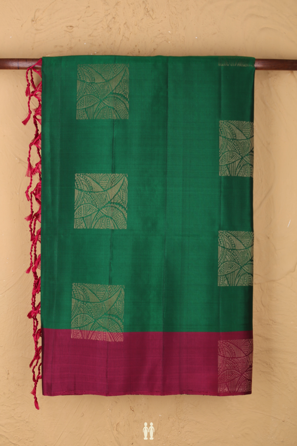 Soft Silk Saree In Green With Zari Motifs