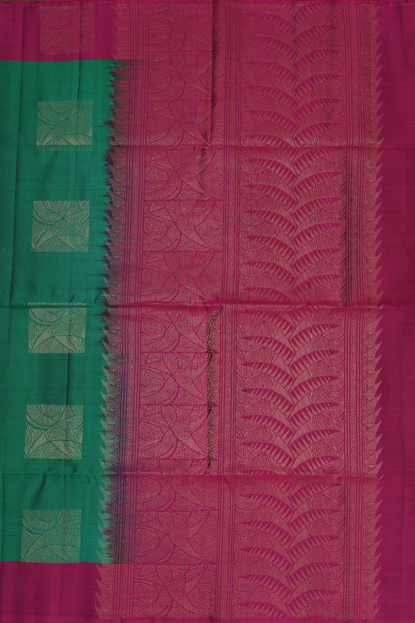 Soft Silk Saree In Green With Zari Motifs