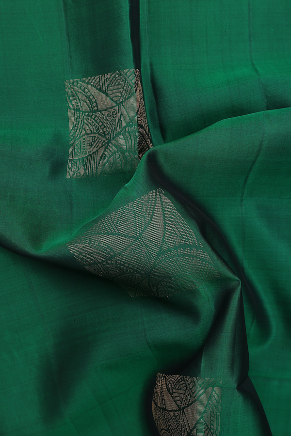 Soft Silk Saree In Green With Zari Motifs