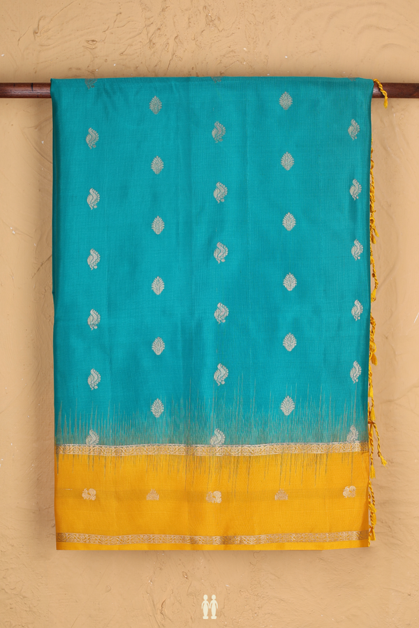 Soft Silk Saree In Peacock Green With Floral Buttis