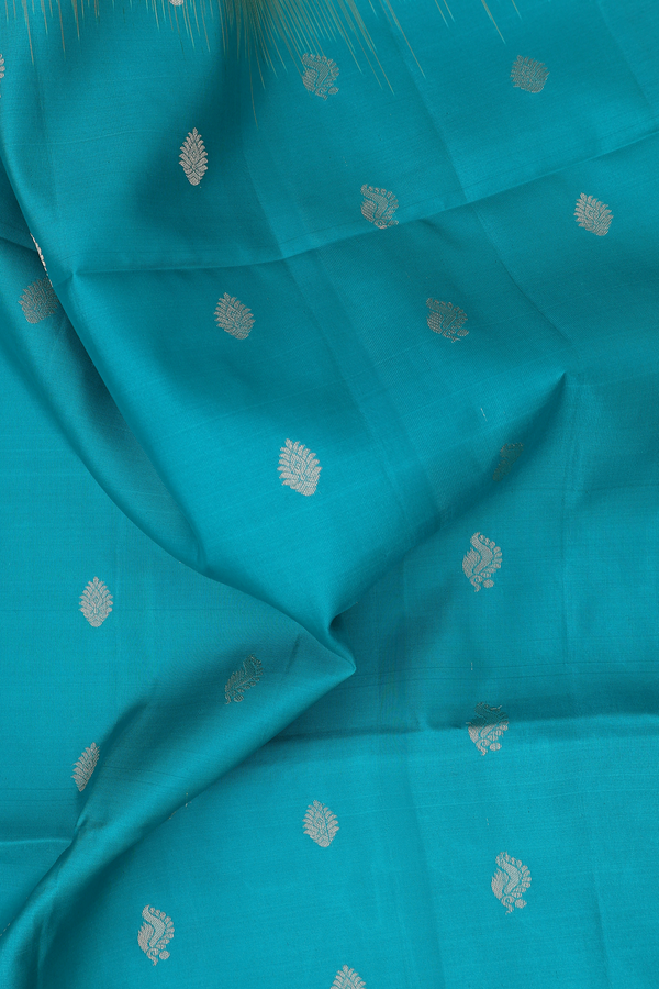 Soft Silk Saree In Peacock Green With Floral Buttis