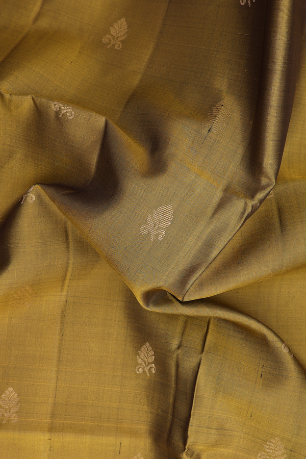 Soft Silk Saree In Greenish Brown With Floral Buttas