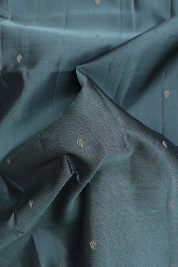 Soft Silk Saree In Greyish Green With Zari Buttis
