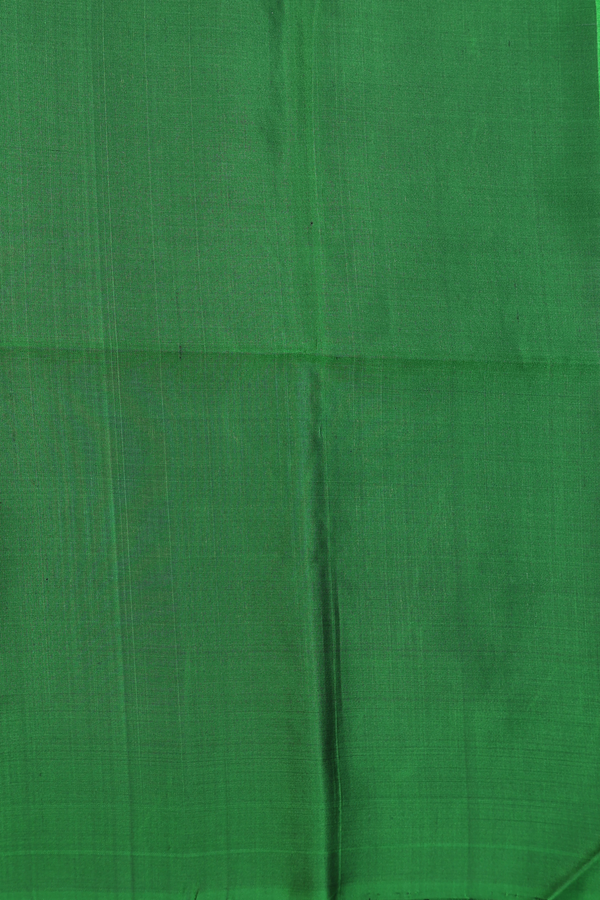 Soft Silk Saree In Leaf Green With Zari Buttas