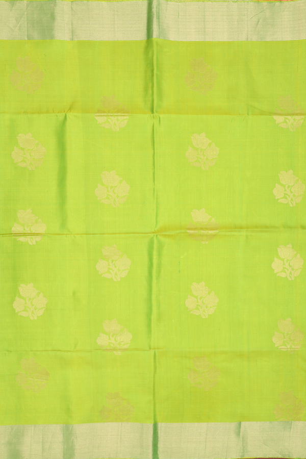 Soft Silk Saree In Lime Green With Floral Buttas