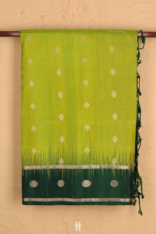 Soft Silk Saree In Parrot Green With Floral Buttis