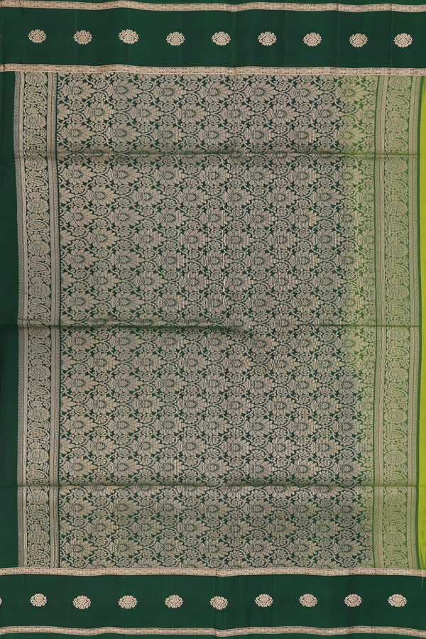 Soft Silk Saree In Parrot Green With Floral Buttis