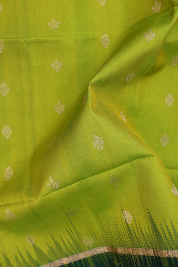 Soft Silk Saree In Parrot Green With Floral Buttis