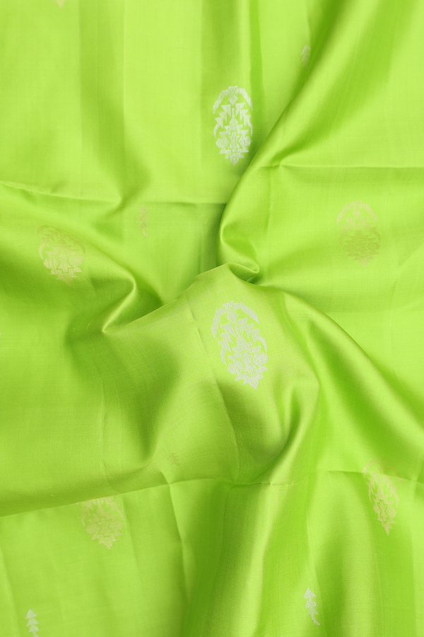 Soft Silk Saree In Lime Green With Zari Buttas