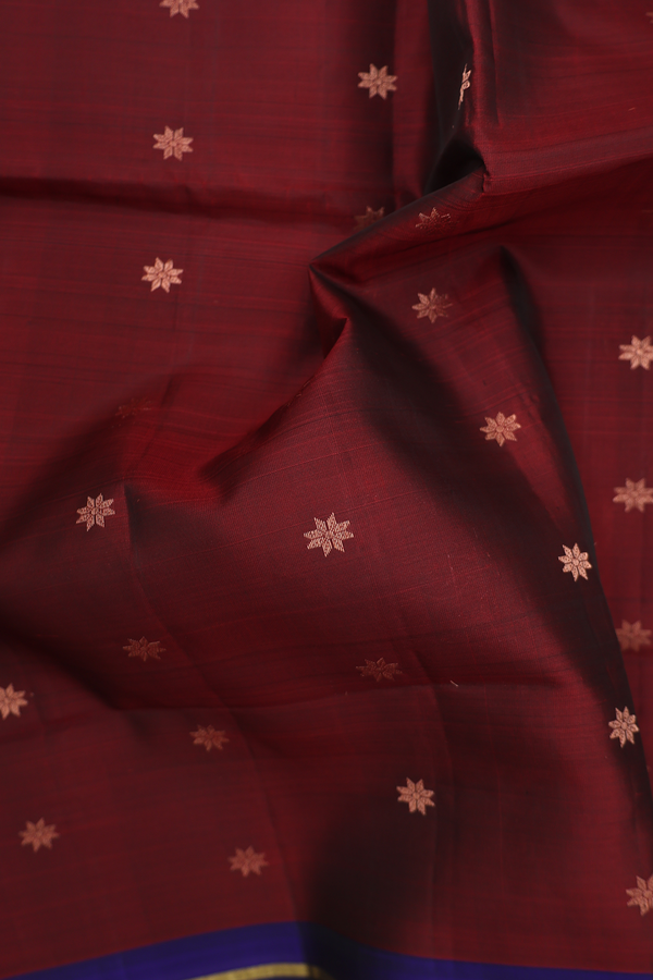 Soft Silk Saree In Maroon With Floral Buttas