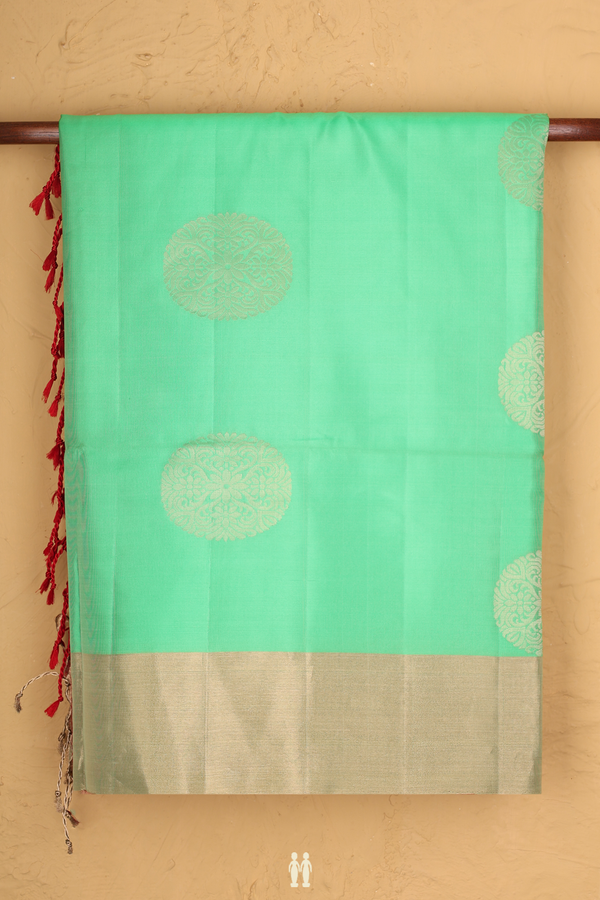 Soft Silk Saree In Mint Green With Zari Motifs