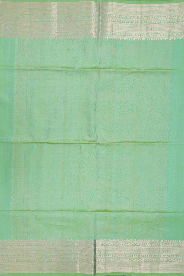 Soft Silk Saree In Moss Green With Floral Buttas