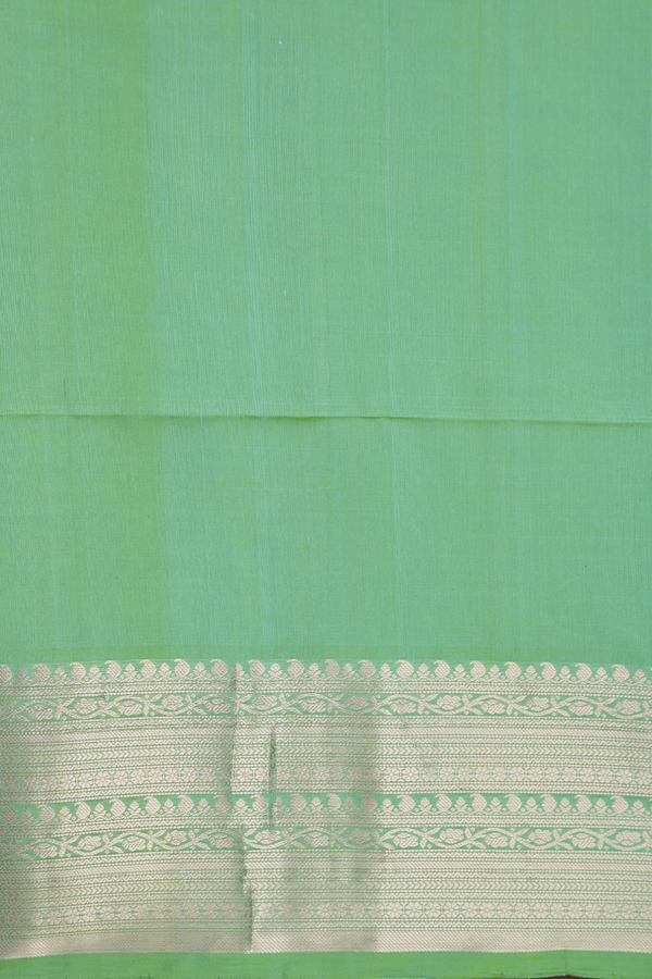 Soft Silk Saree In Moss Green With Floral Buttas