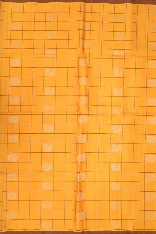 Soft Silk Saree In Honey Orange Along Checks With Buttas
