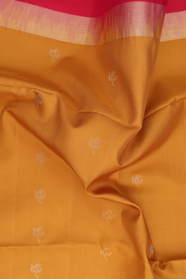 Soft Silk Saree In Ochre Orange With Floral Buttas