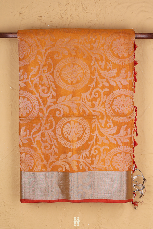 Soft Silk Saree In Ochre Orange With Floral Design