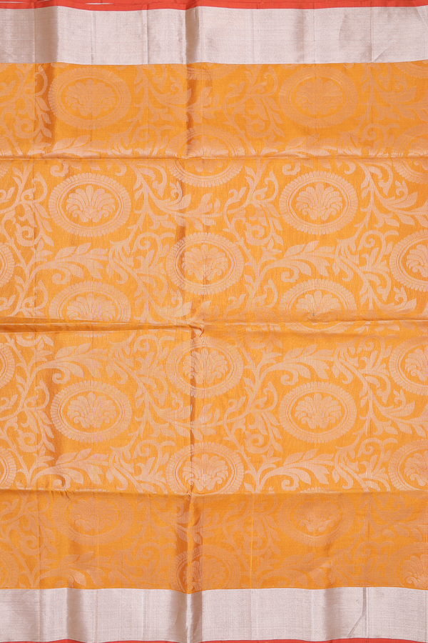 Soft Silk Saree In Ochre Orange With Floral Design