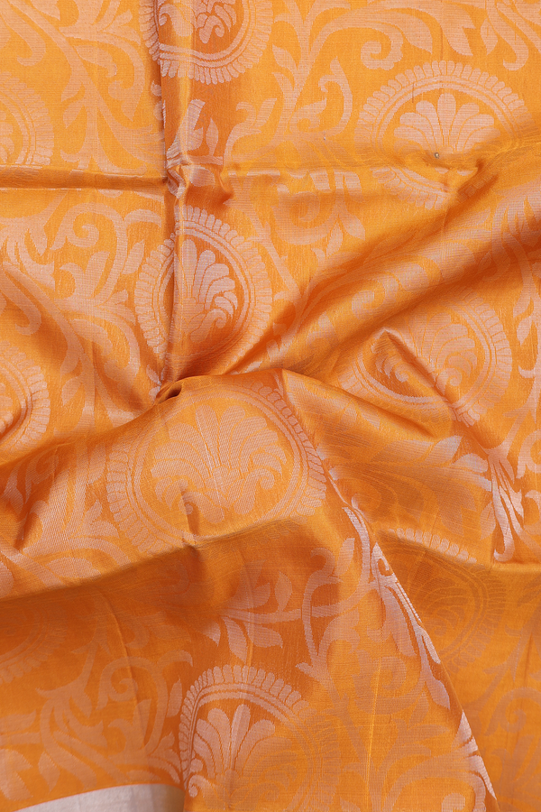 Soft Silk Saree In Ochre Orange With Floral Design