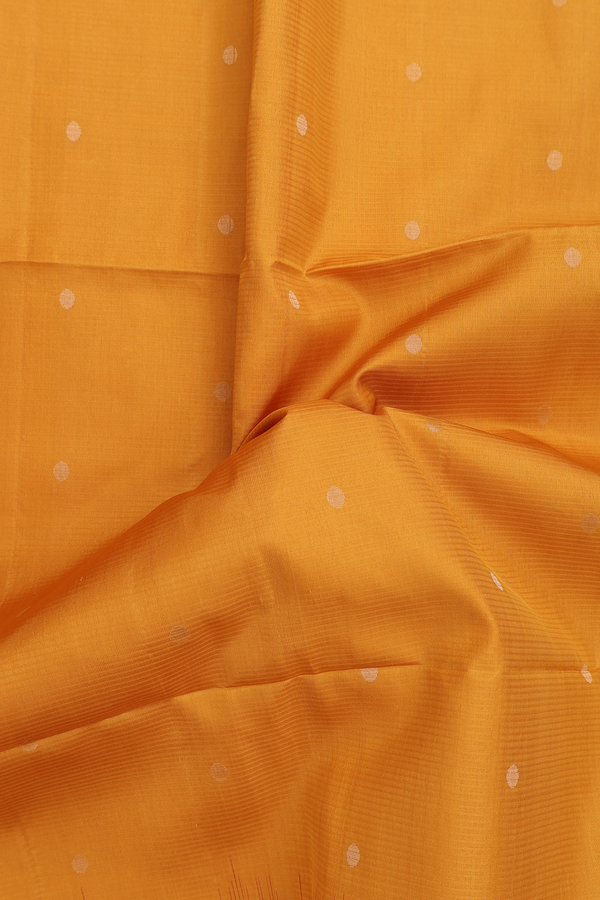 Soft Silk Saree In Ochre Orange With Zari Buttas