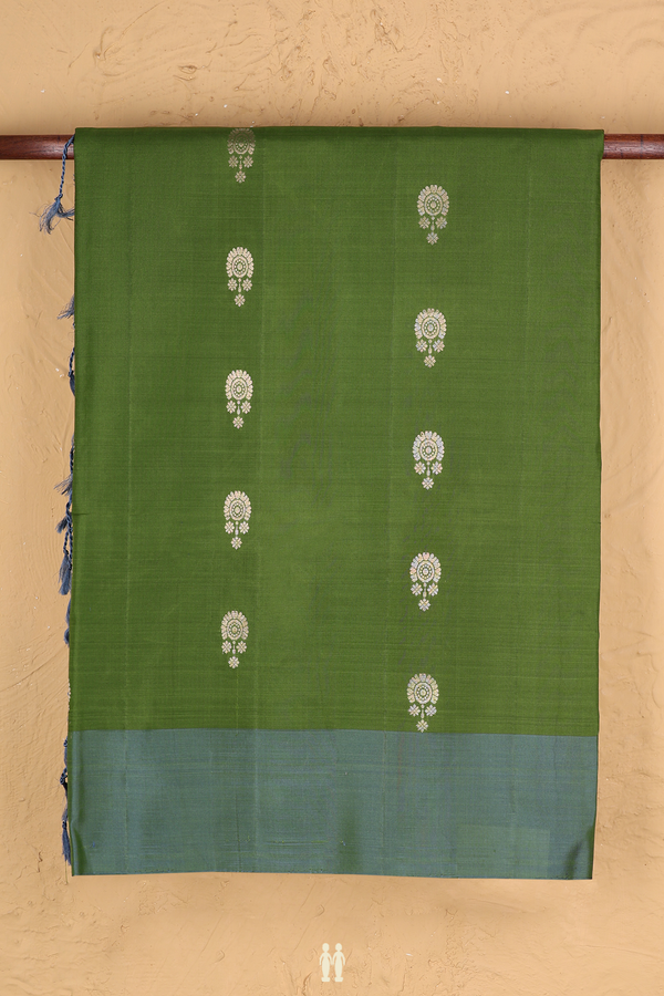 Soft Silk Saree In Fern Green With Floral Buttas