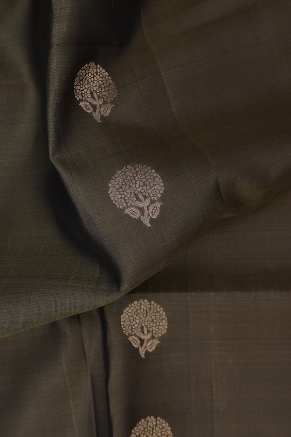 Soft Silk Saree In Olive Green With Floral Buttas