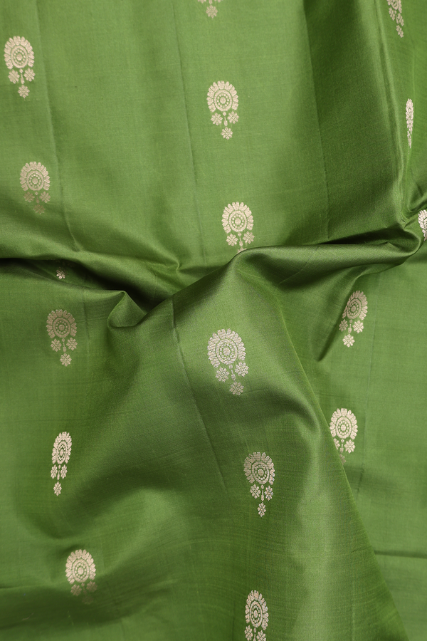 Soft Silk Saree In Fern Green With Floral Buttas