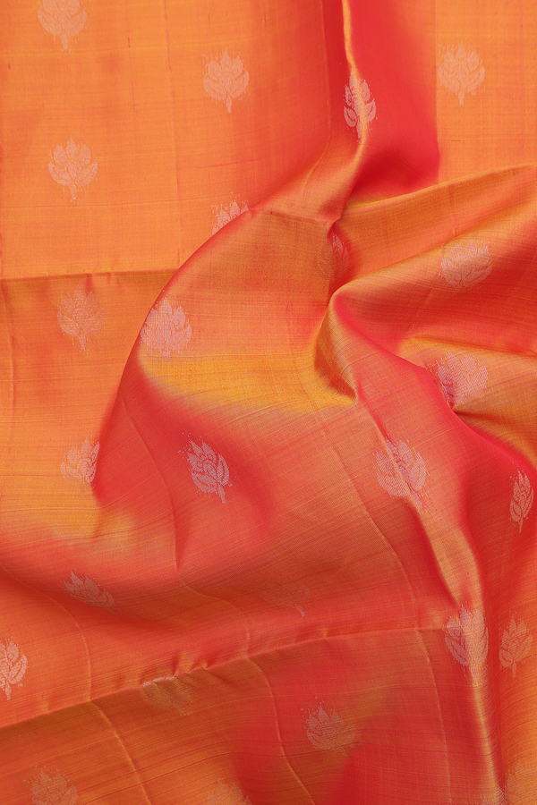 Soft Silk Saree In Orange With Floral Buttas