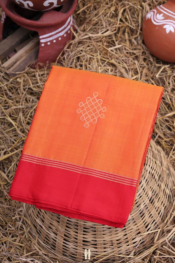Soft Silk Saree In Orange With Kolam Buttas