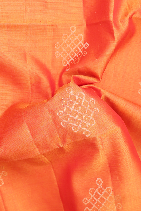 Soft Silk Saree In Orange With Kolam Buttas
