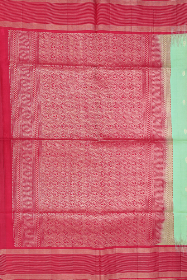 Soft Silk Saree In Pale Green With Floral Buttas