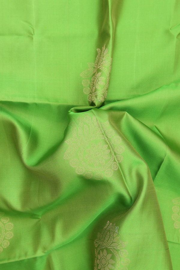 Soft Silk Saree In Parrot Green With Floral Motifs