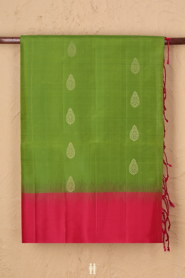 Soft Silk Saree In Parrot Green With Zari Buttas